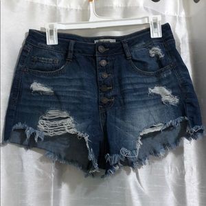 Blue ripped shorts